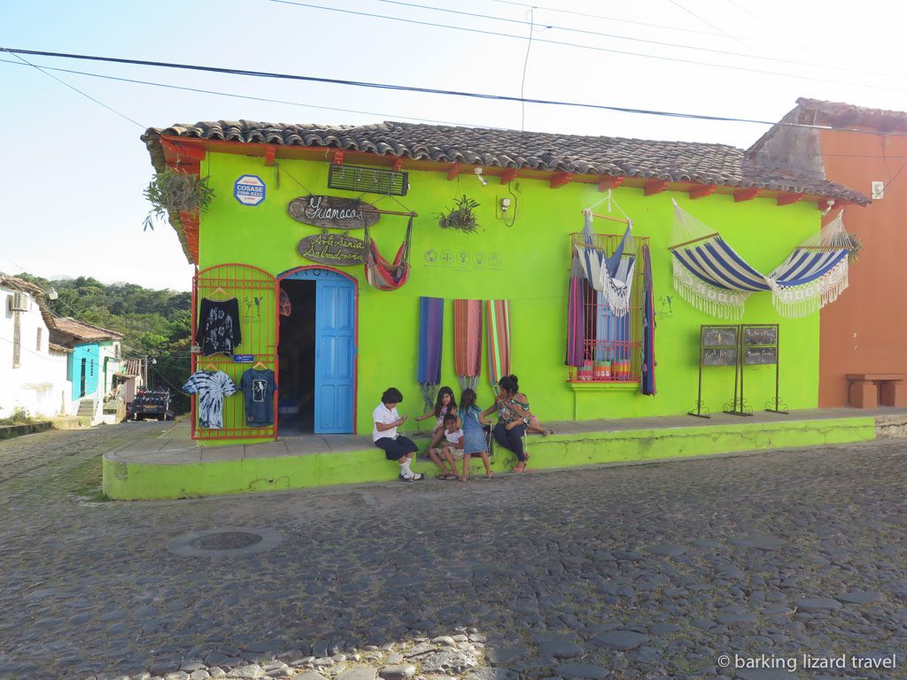 A colourful lime green store front in Suchitoto