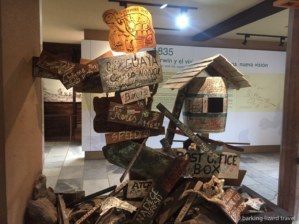 A photo of tourist graffiti on galapagos island signs at the Interpretation Center San Cristobal