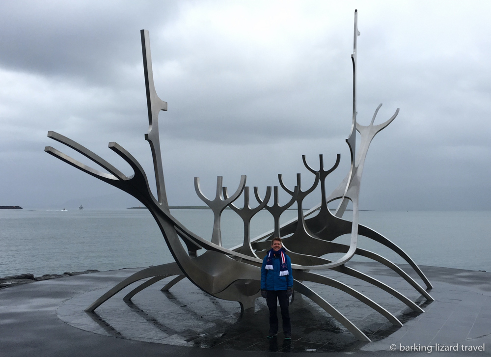 photo of Lydia in front of the Sun Voyager sculpture in Reykjavík Iceland