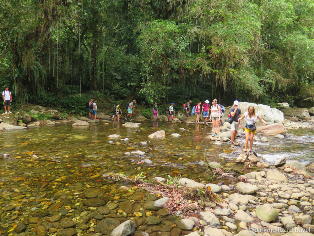 Group uses stepping stones to cross ariver