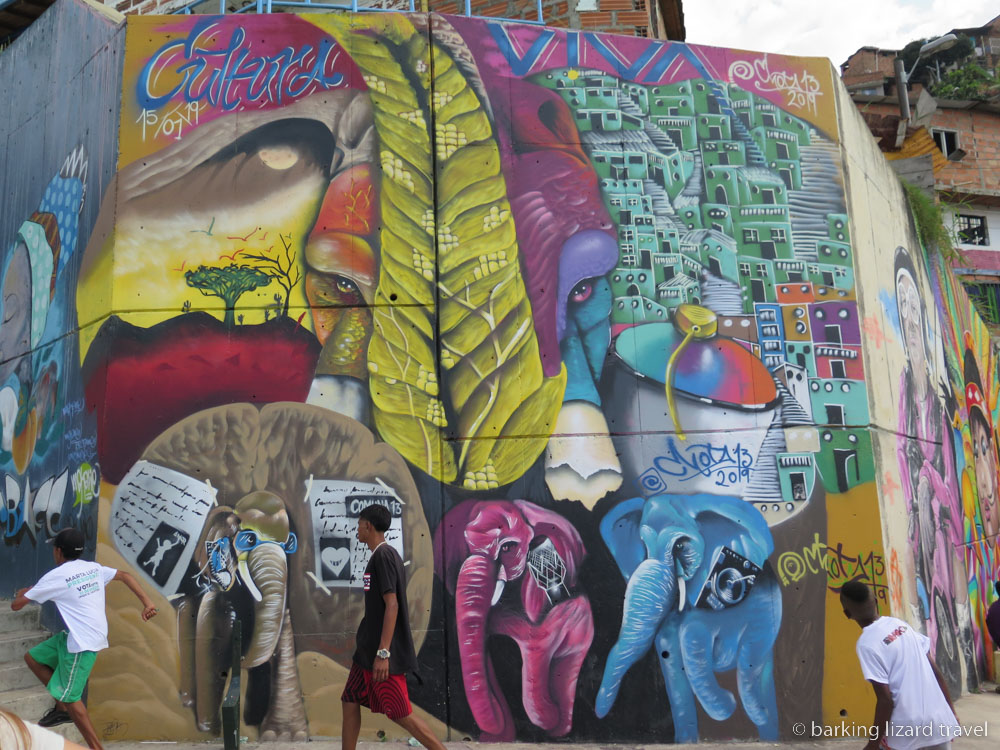 a photo of a colourful Wall mural in the Comuna 13 neighbourhood in Medellín