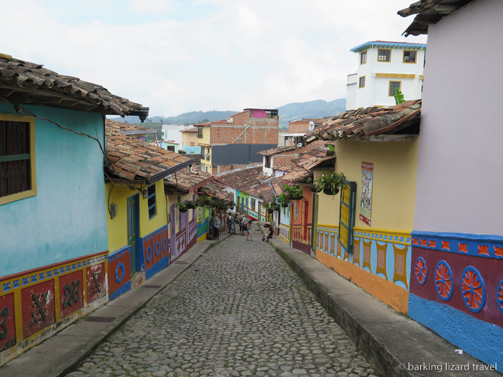 A photo of a street with colourful houses in Guatape