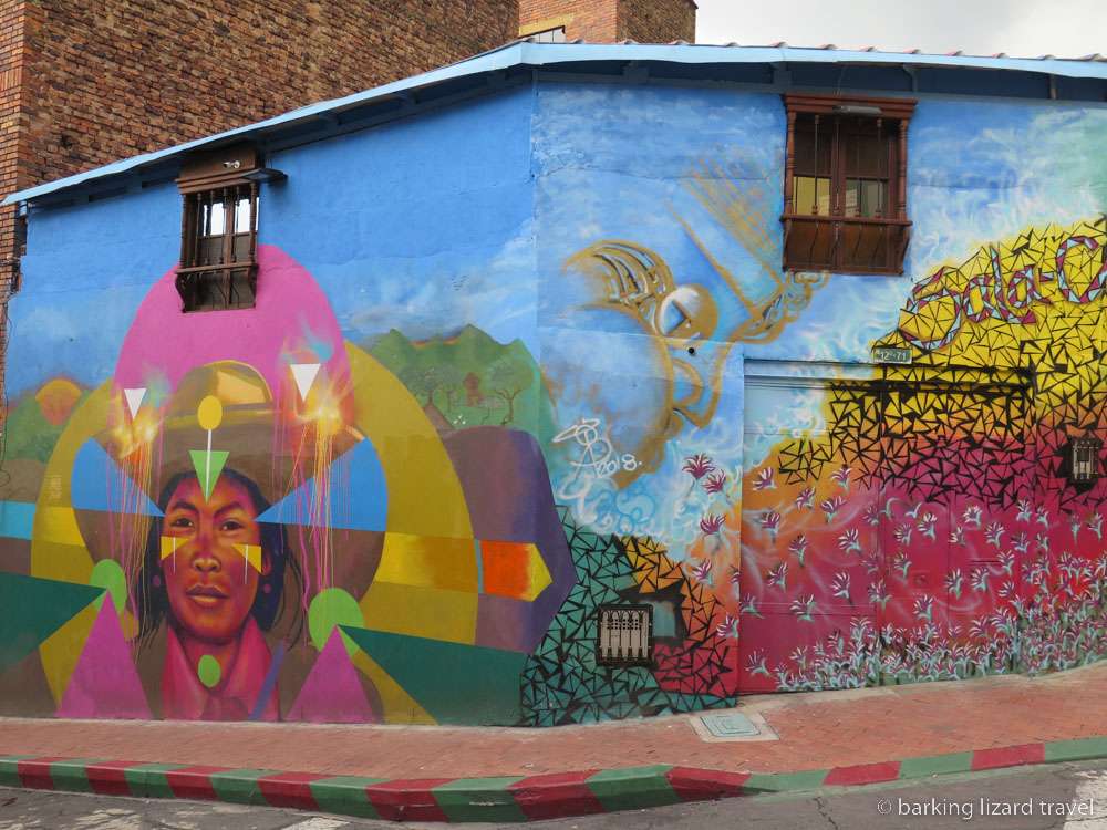 a photo of a large colourful wall mural in Bogota