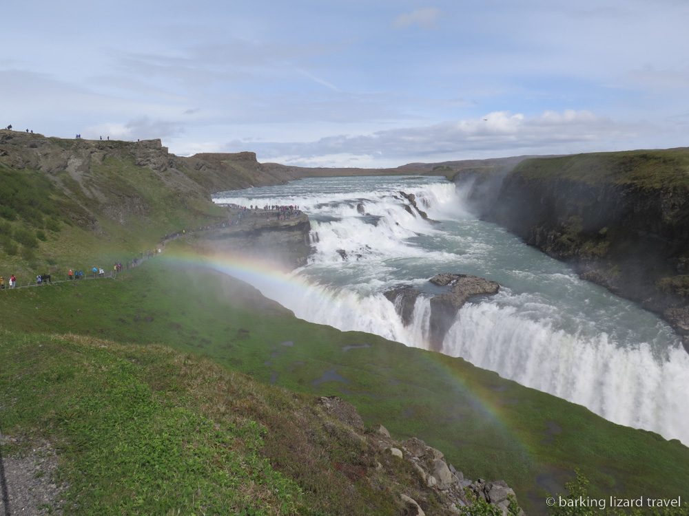 photo of the spray from Gullfoss waterfall creating a rainbow